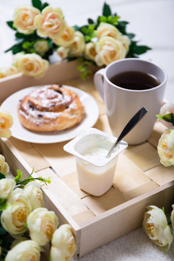 Good Morning - Breakfast with Bun, Yoghurt and Tea on Wooden Tray Stock ...