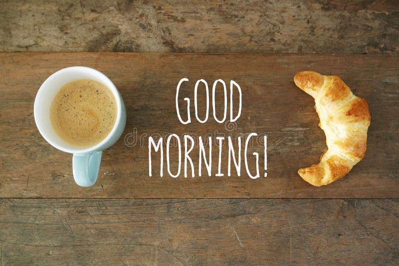 A good morning message with a cup of offee and croissant. A good morning message with a cup of offee and croissant.
