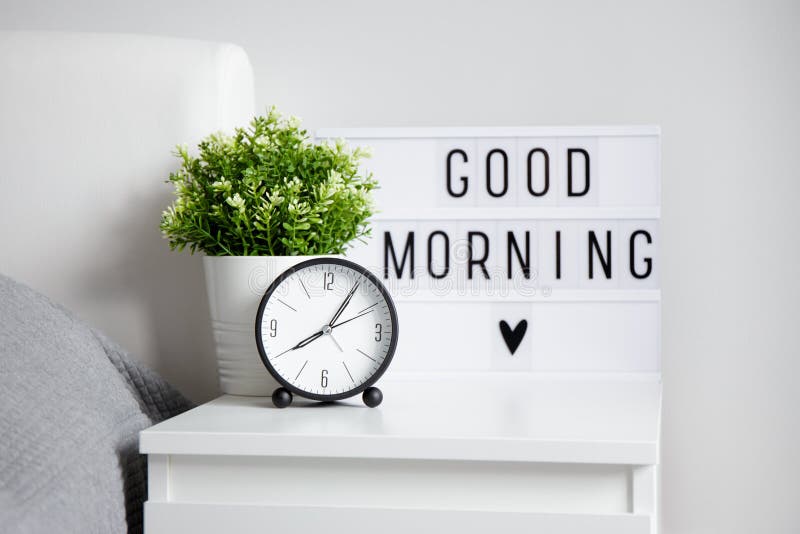 Good Morning Concept - Alarm Clock, Houseplant and Lightbox with Stock ...