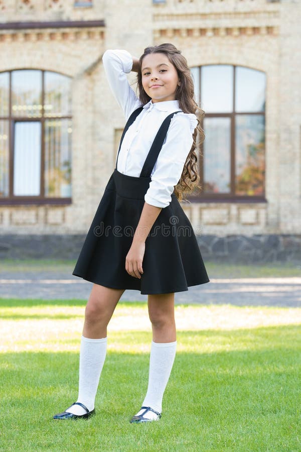 A Good Outfit. Happy Schoolgirl in Stylish Uniform. Childhood Happiness ...