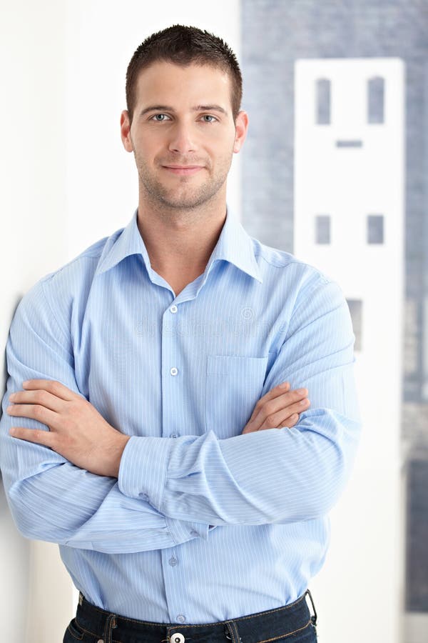 Goodlooking man smiling confidently