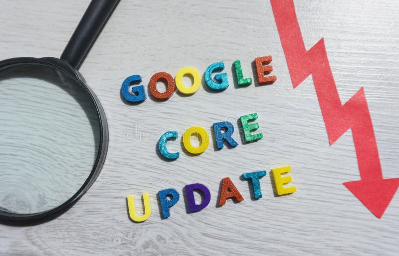 Google core update text with magnifying glass and an arrow