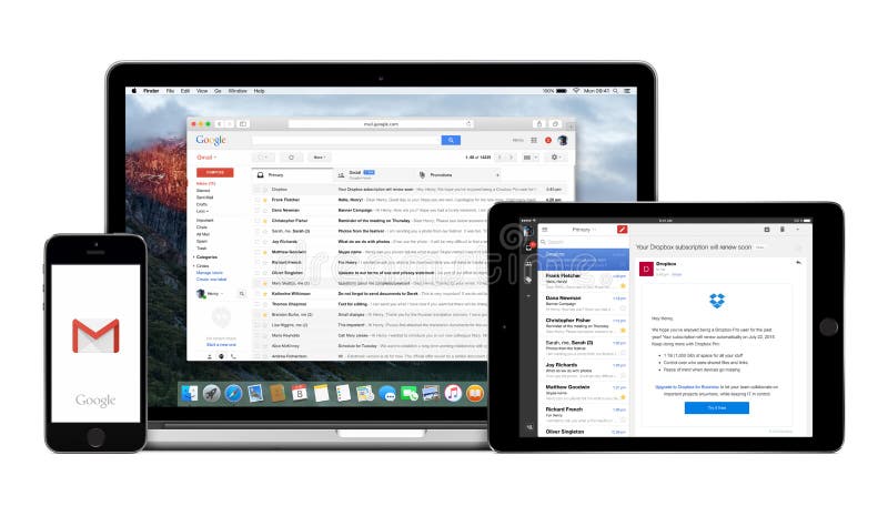 Google Gmail app on Apple iPhone iPad and Macbook Pro displays stock images