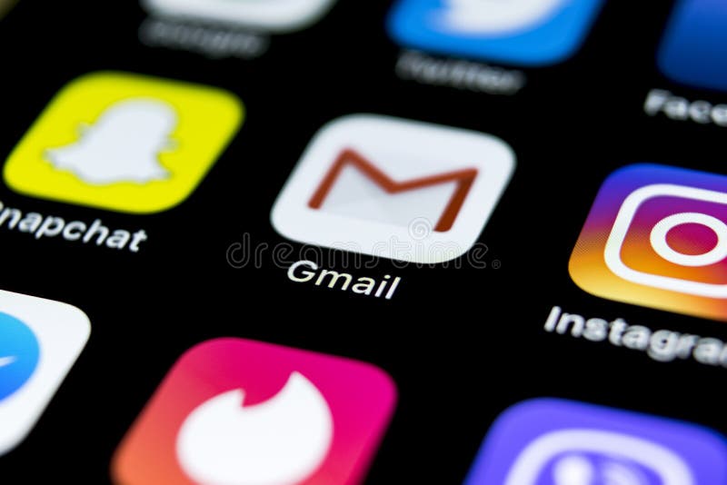 Google Gmail application icon on Apple iPhone X smartphone screen close-up. Gmail app icon. Gmail is popular Internet online e-ma stock images