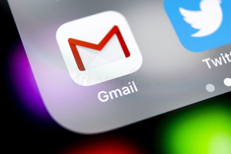 Google Gmail application icon on Apple iPhone X smartphone screen close-up. Gmail app icon. Gmail is popular Internet online e-ma stock photos