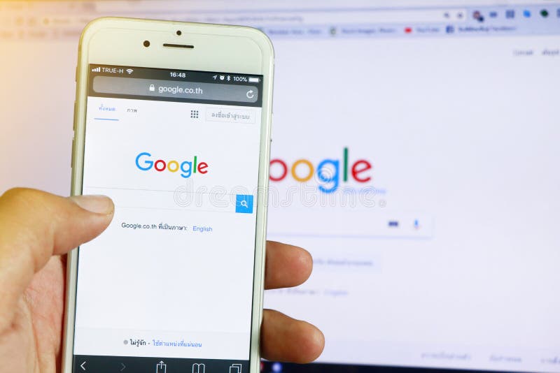 A smartphone and computer running google search.