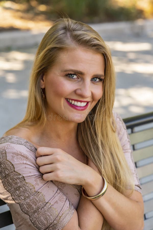 A Lovely Blonde Model Enjoys A Summers Day Outdoors At The Park Stock Image Image Of Feminine