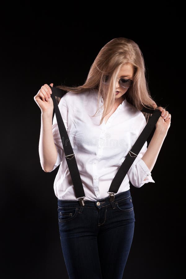 Gorgeous Blonde Model with Suspenders and White Shirt Stock Image ...