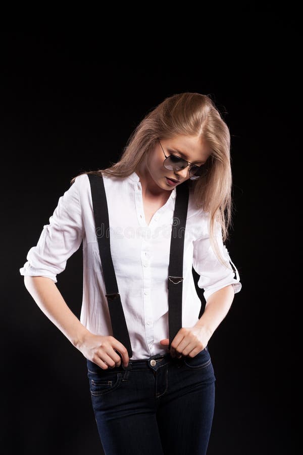 Gorgeous Blonde Woman with Suspenders and White Shirt Stock Photo ...