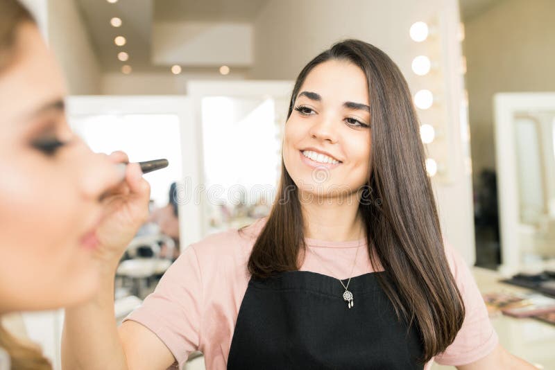 Gorgeous makeup artist at work royalty free stock photos Gorgeous makeup artist at work royalty free stock photos