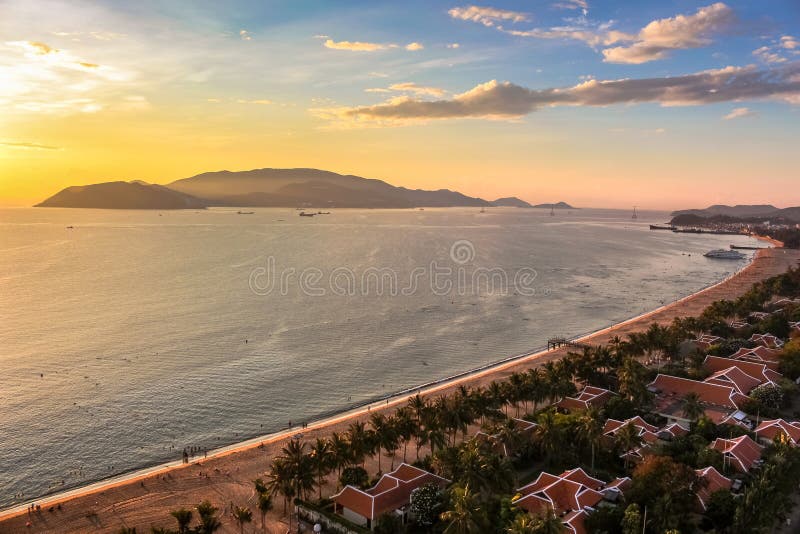 Seascape with Aerial View of Nha Trang Beach, Islands, Mountains and Bay at Colorful Sunrise stock photo Seascape with Aerial View of Nha Trang Beach, Islands, Mountains and Bay at Colorful Sunrise stock photo