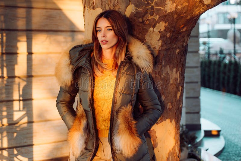 Gorgeous pretty woman in furry coat jacket stand urban background. Trendy outfit. Her confidence is stunning. Woman stock photography Gorgeous pretty woman in furry coat jacket stand urban background. Trendy outfit. Her confidence is stunning. Woman stock photography
