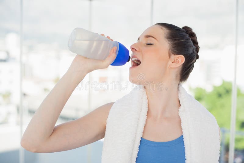 Gorgeous slender woman hydrating stock photos Gorgeous slender woman hydrating stock photos