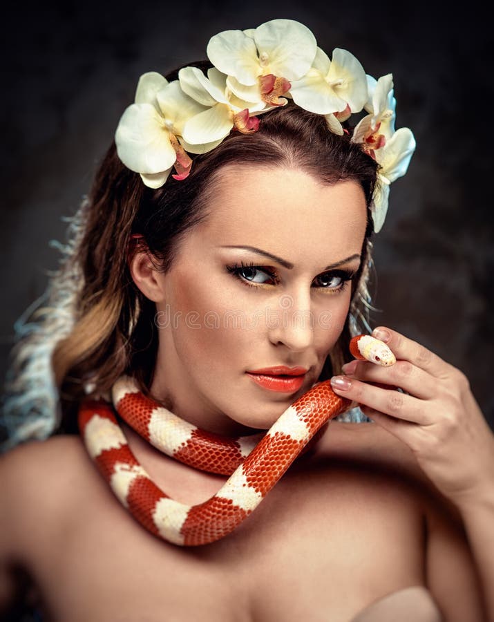 Woman with snake stock photo. Image of human, orange 35346126