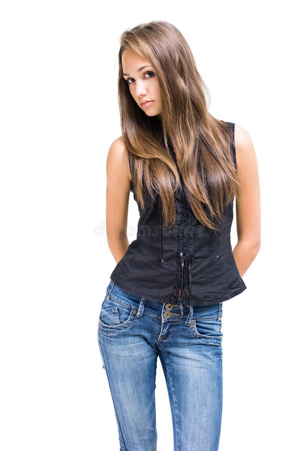 Gorgeous young brunette girl posing in jeans. stock photo