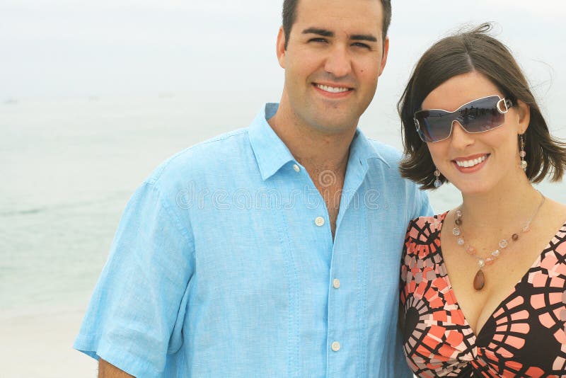 Gorgeous young couple at the beach