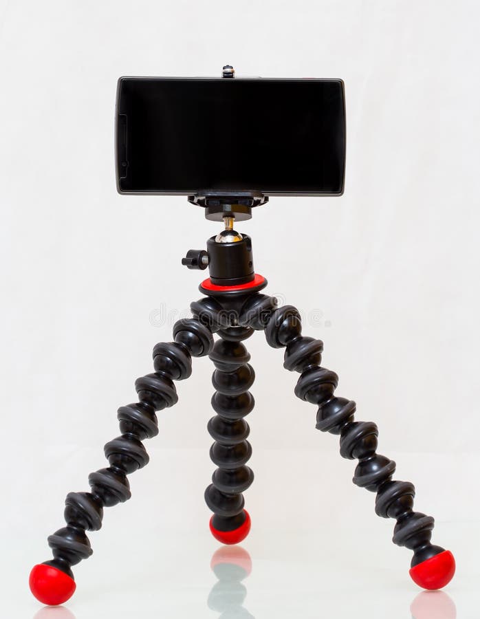 Mini Tripod ball head With black smartphone. Mini Tripod ball head With black smartphone