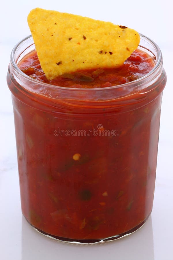 Artisan mexican dip salsa on vintage carrara marble table, with a delicious fresh mexican or tex-mex flavor. Artisan mexican dip salsa on vintage carrara marble table, with a delicious fresh mexican or tex-mex flavor