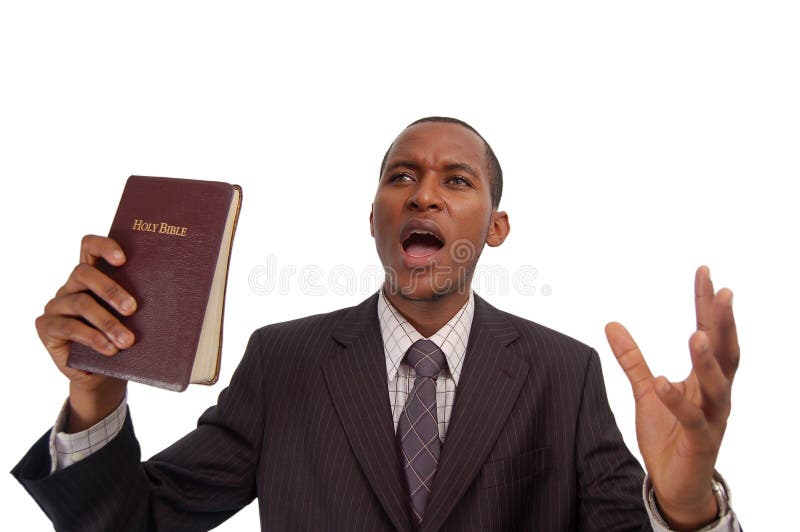 This is an image of man holding a bible. This image can be used to represent sermon, preaching etc. This is an image of man holding a bible. This image can be used to represent sermon, preaching etc...