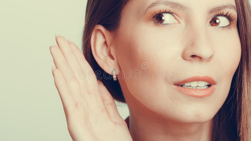 Gossip Girl Eavesdropping With Hand To Ear Stock Image Image Of