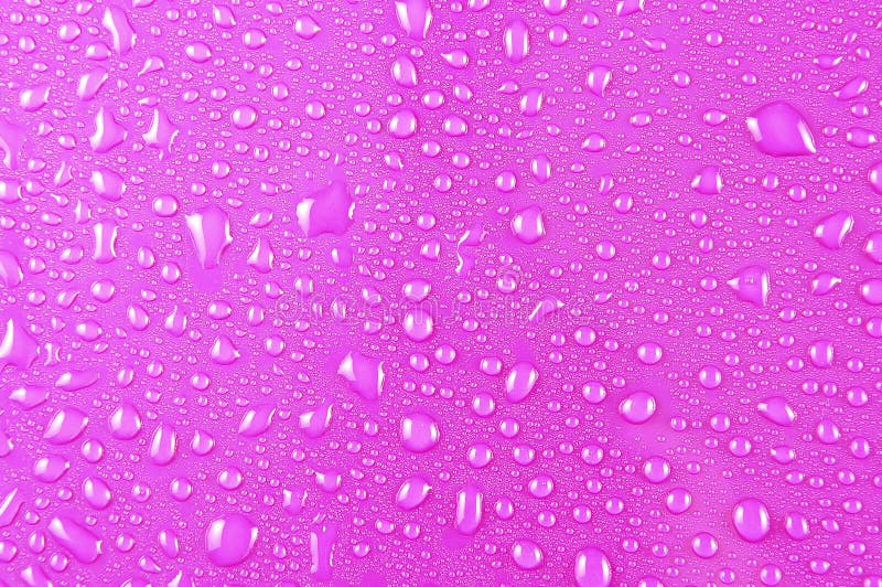 Gotas del agua en color de rosa fotos de archivo Gotas del agua en color de rosa fotos de archivo