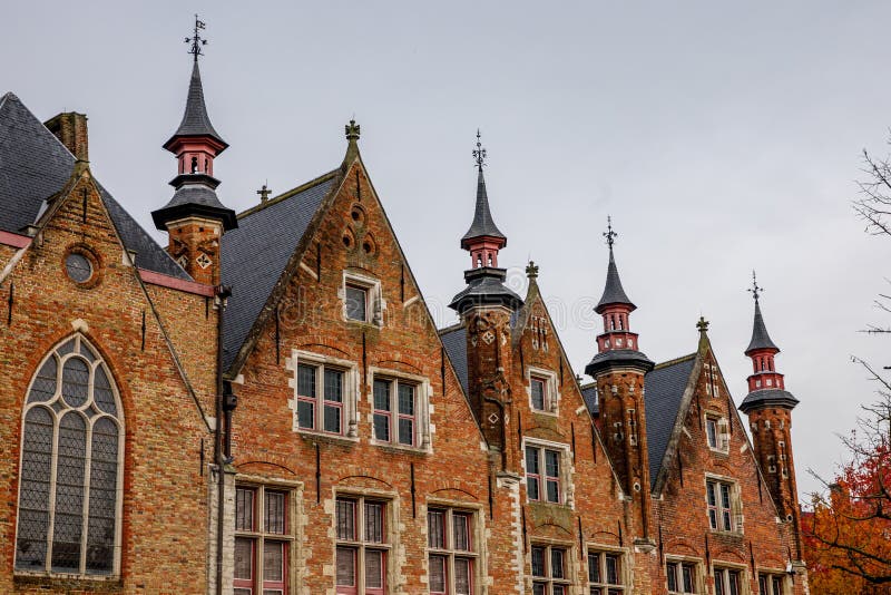 Gothic Architecture. Palace Spiers in Bruges, Belgium. Stock Photo