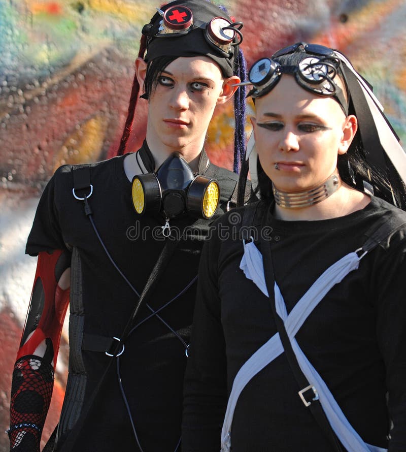 Gothic boys with dracula eyes at Goth-festival. Stylish dressed young wave gothic boys in cyber look wearing black clothes and dracula eyes. They are at one of royalty free stock photos Gothic boys with dracula eyes at Goth-festival. Stylish dressed young wave gothic boys in cyber look wearing black clothes and dracula eyes. They are at one of royalty free stock photos