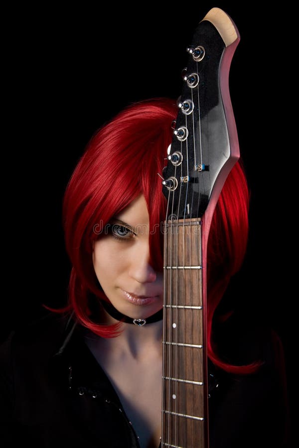 Gothic girl with guitar stock images