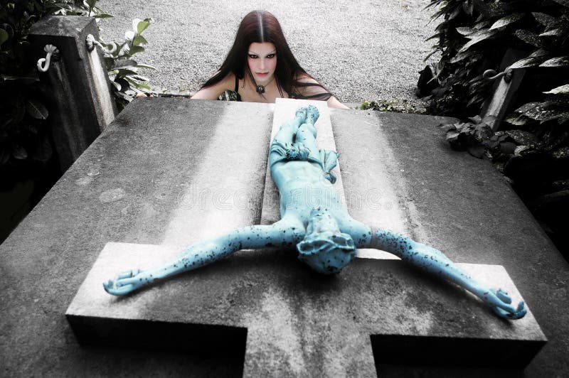 Gothic girl on inverted cross