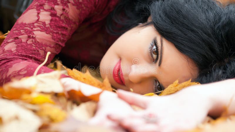 Gothic girl in the leaves