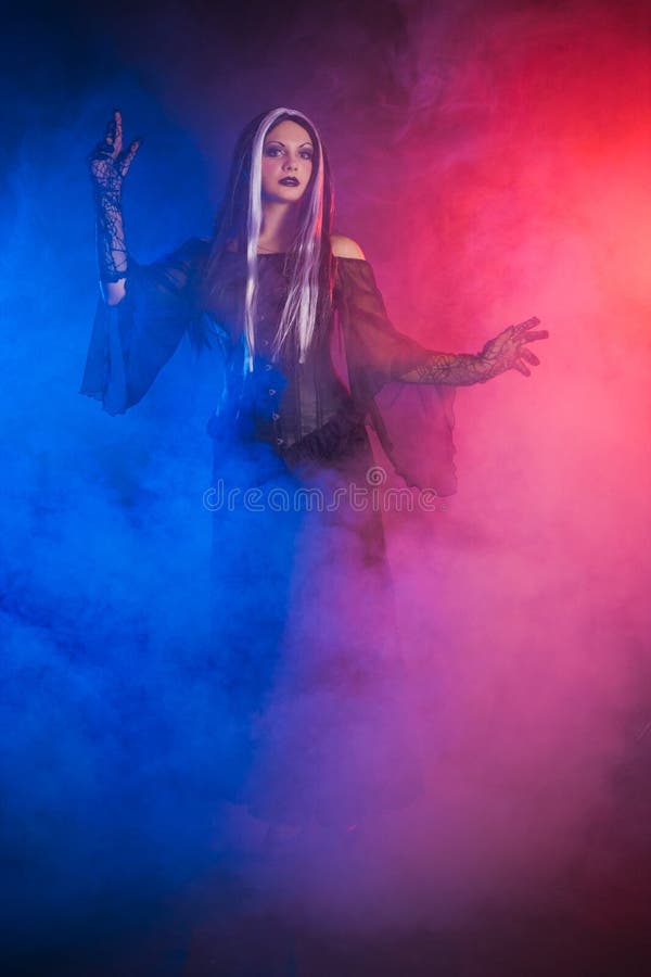 Gothic girl on smoke background