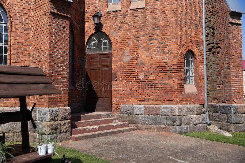 Gothic-style church, characterized by its pointed arches, tall spires, and intricate brickwork. The architecture stock photo