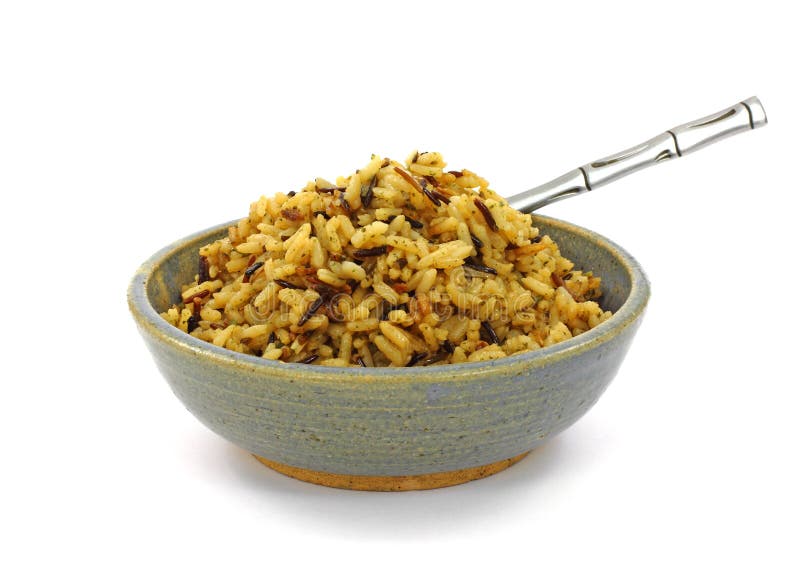 A close view view of cooked seasoned long grain wild rice. A close view view of cooked seasoned long grain wild rice.
