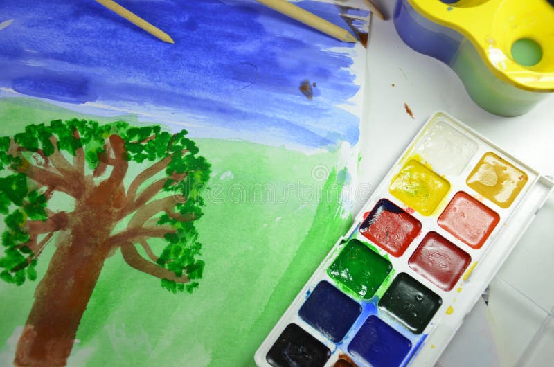 Gouache Paint Brushes and Children S Drawings. Photo Child Paints a Brush  with Watercolor Honey Paints. Children S Art Stock Image - Image of  colorful, hobby: 201807447