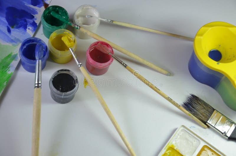 Gouache Paint Brushes and Children S Drawings. Photo Child Paints a Brush  with Watercolor Honey Paints. Children S Art Stock Image - Image of  colorful, hobby: 201807447