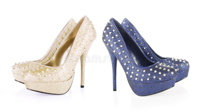 Gouden en marineblauw schitter spiked schoenen stock foto's Gouden en marineblauw schitter spiked schoenen stock foto's