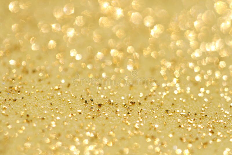 Gouden schitter de achtergrond van het fonkelingenstof stock afbeeldingen Gouden schitter de achtergrond van het fonkelingenstof stock afbeeldingen