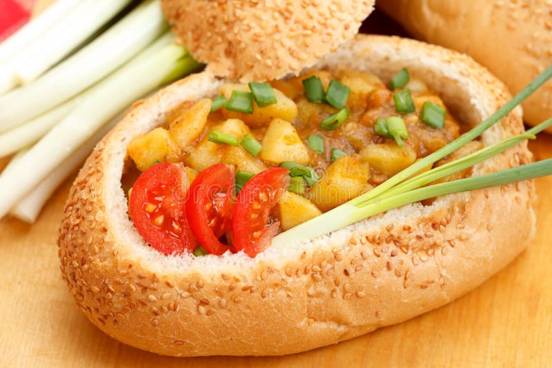Goulash in bread bowl stock image. Image of meal, bowl 19188041