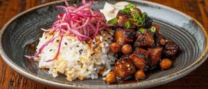 Gourmet Asian Inspired Rice Bowl With Marinated Pork And Pickled Gourmet Asian Inspired Rice Bowl With Marinated Pork And Pickled