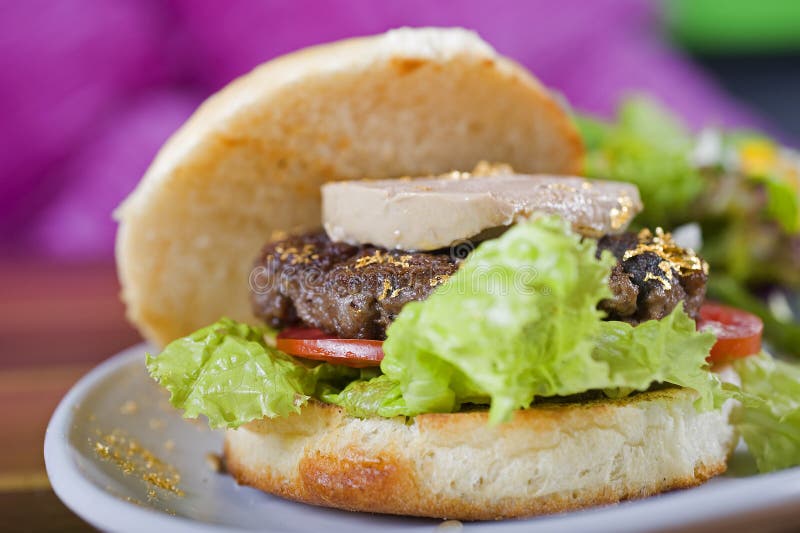 Gourmet burger with fois gras in a bun