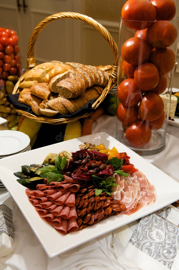 Gourmet plate of meats and olives