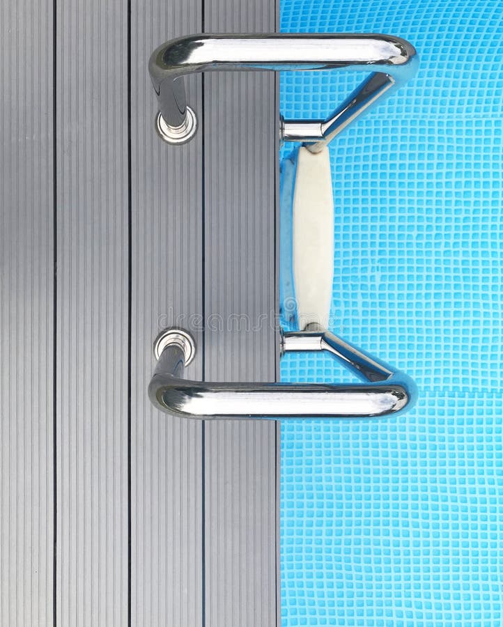 Grab bars ladder in the blue swimming pool, top view