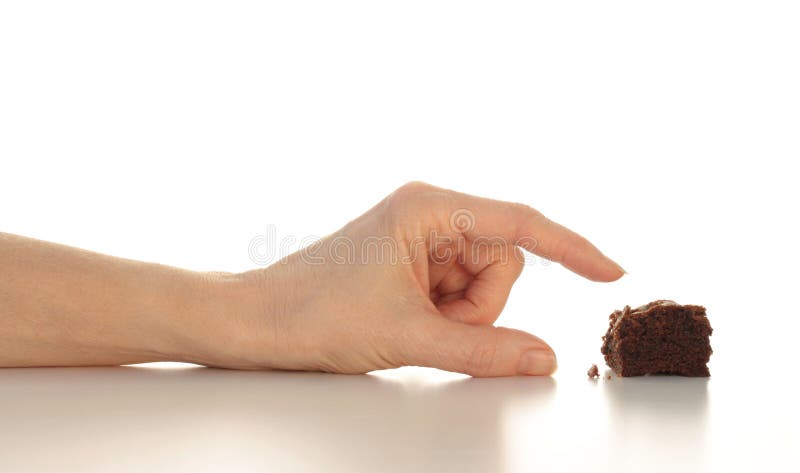 Grabbing the Last Chocolate Brownie royalty free stock photography