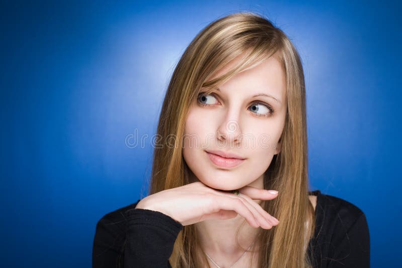 Graceful cute young blond woman. stock photo