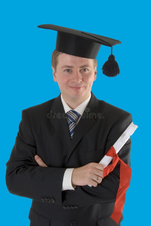 Half body portrait of young male graduate in suit with degree certificate and academic hat, blue background. Half body portrait of young male graduate in suit with degree certificate and academic hat, blue background.