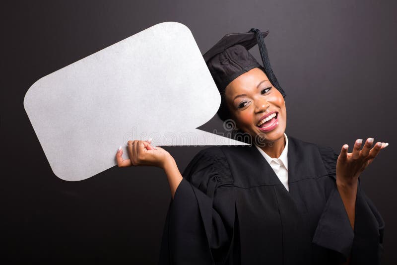 Graduate holding speech bubble stock photos