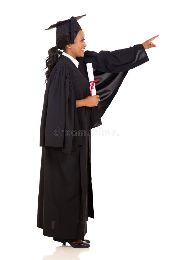 Graduate pointing empty space royalty free stock photo