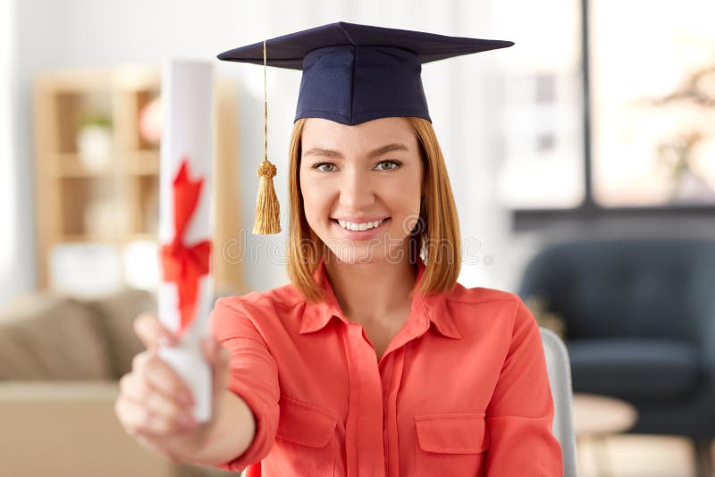 Graduate student woman with diploma at home royalty free stock photography Graduate student woman with diploma at home royalty free stock photography