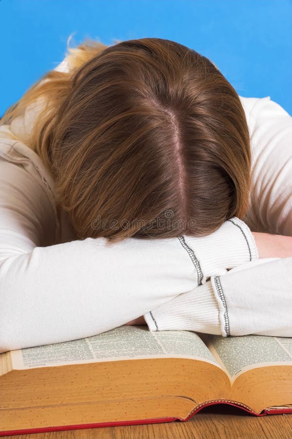 Young girl studying for graduation. Young girl studying for graduation