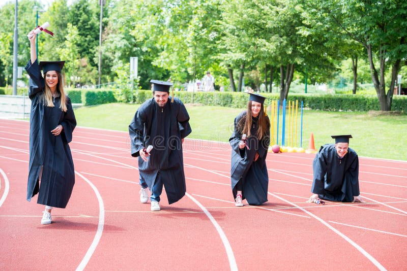 Graduation Group of Students Celebrating on Athletic Track, Prep Stock
